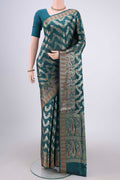 Sea Green Banarasi Raw Silk Saree with Zari Brocade on the body and Zari And Thread Border.  displayed on a mannequin