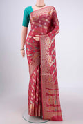 Pink Banarasi Tussar Silk Saree with Zari Brocade on the body and Zari And Thread Border.  displayed on a mannequin