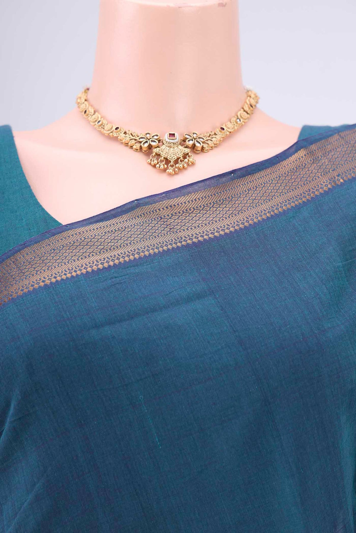 Border image of Peacock Blue Mangalagiri Cotton Saree with Plain Body and Zari Border. 