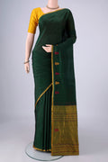 Bottle Green Kanchipuram Silk Saree with Plain Body and Thread Border.  displayed on a mannequin