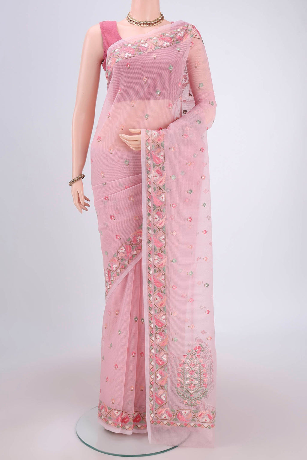 Pink Kota Cotton Saree with Embroidery on the body and Thread Border.  displayed on a mannequin