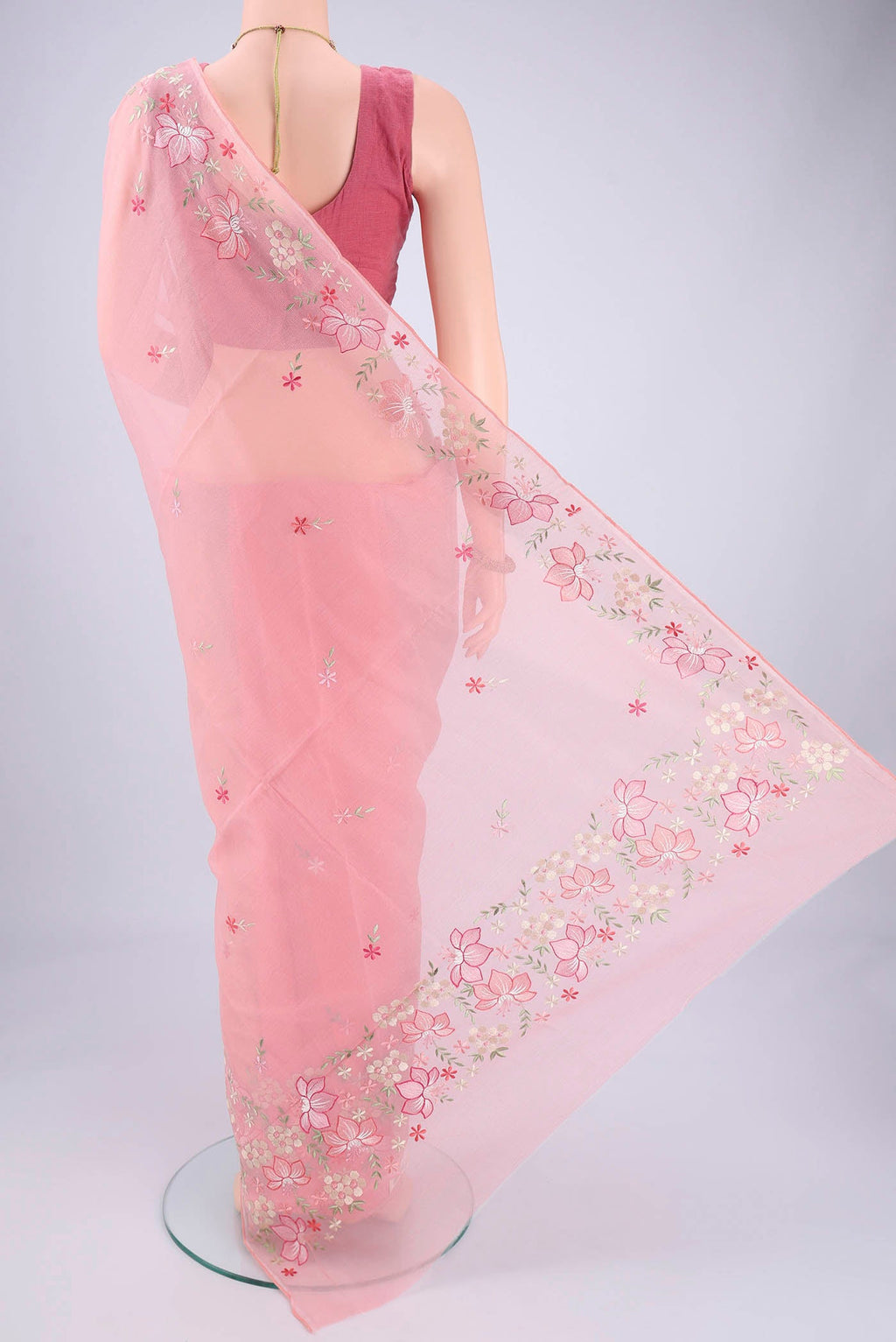 Flat view of Peach Blended Kota Cotton Saree with Embroidery on the body and Thread Border. 