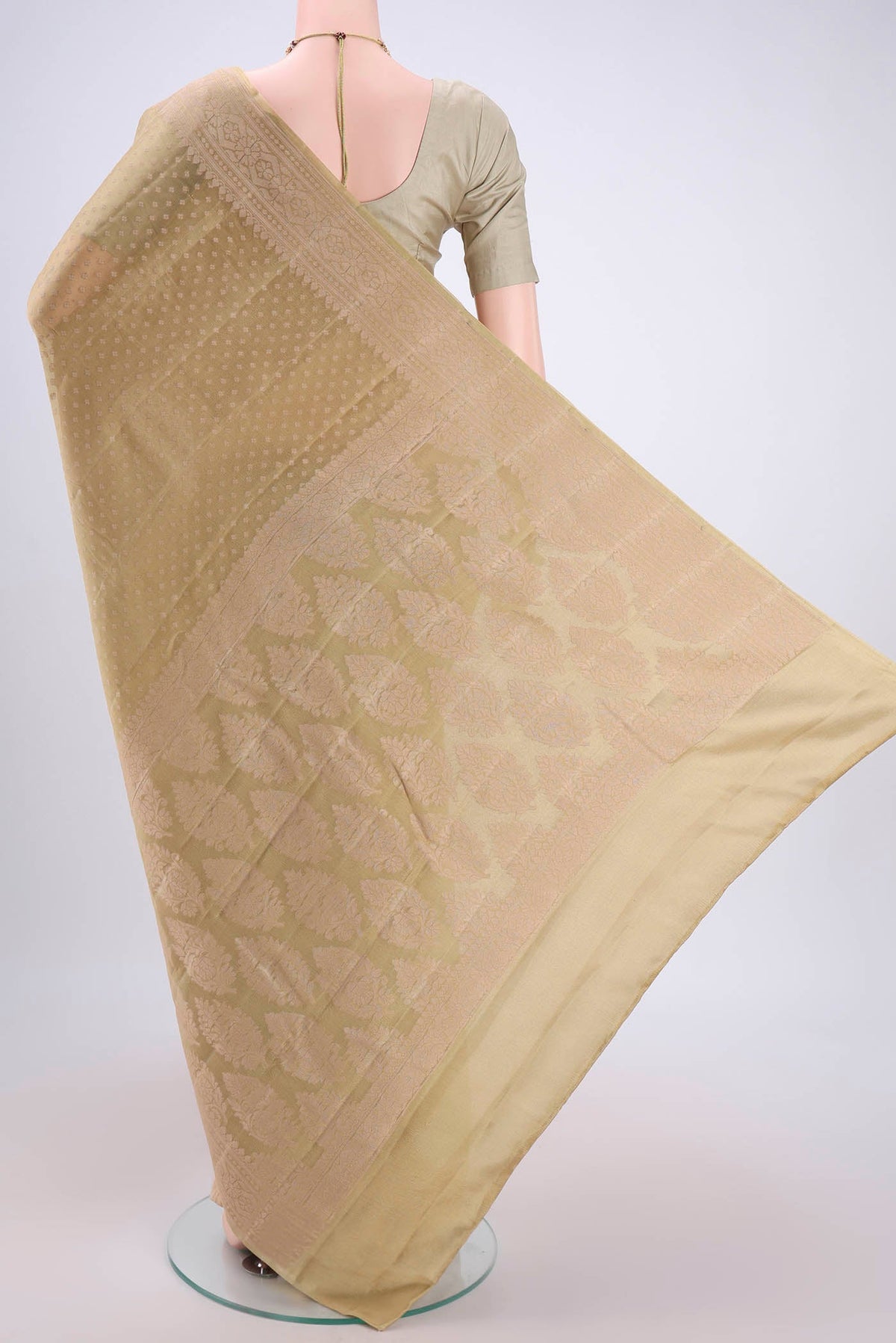 Flat view of Beige Blended Banarasi Georgette Saree with Thread Butta on the body and Thread Border. 