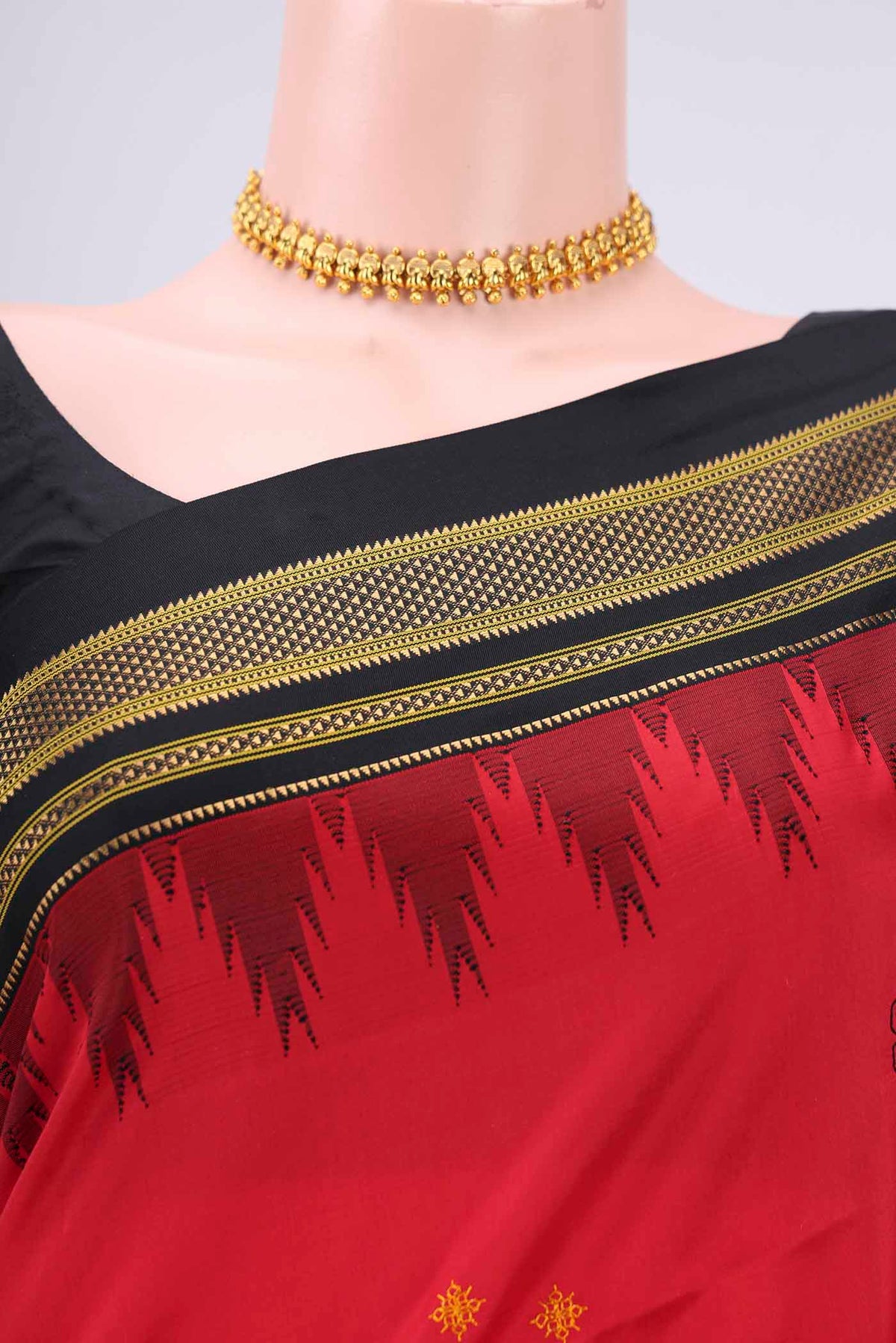 Border image of Red Bangalore Silk Saree with Embroidery on the body and Temple Border. 