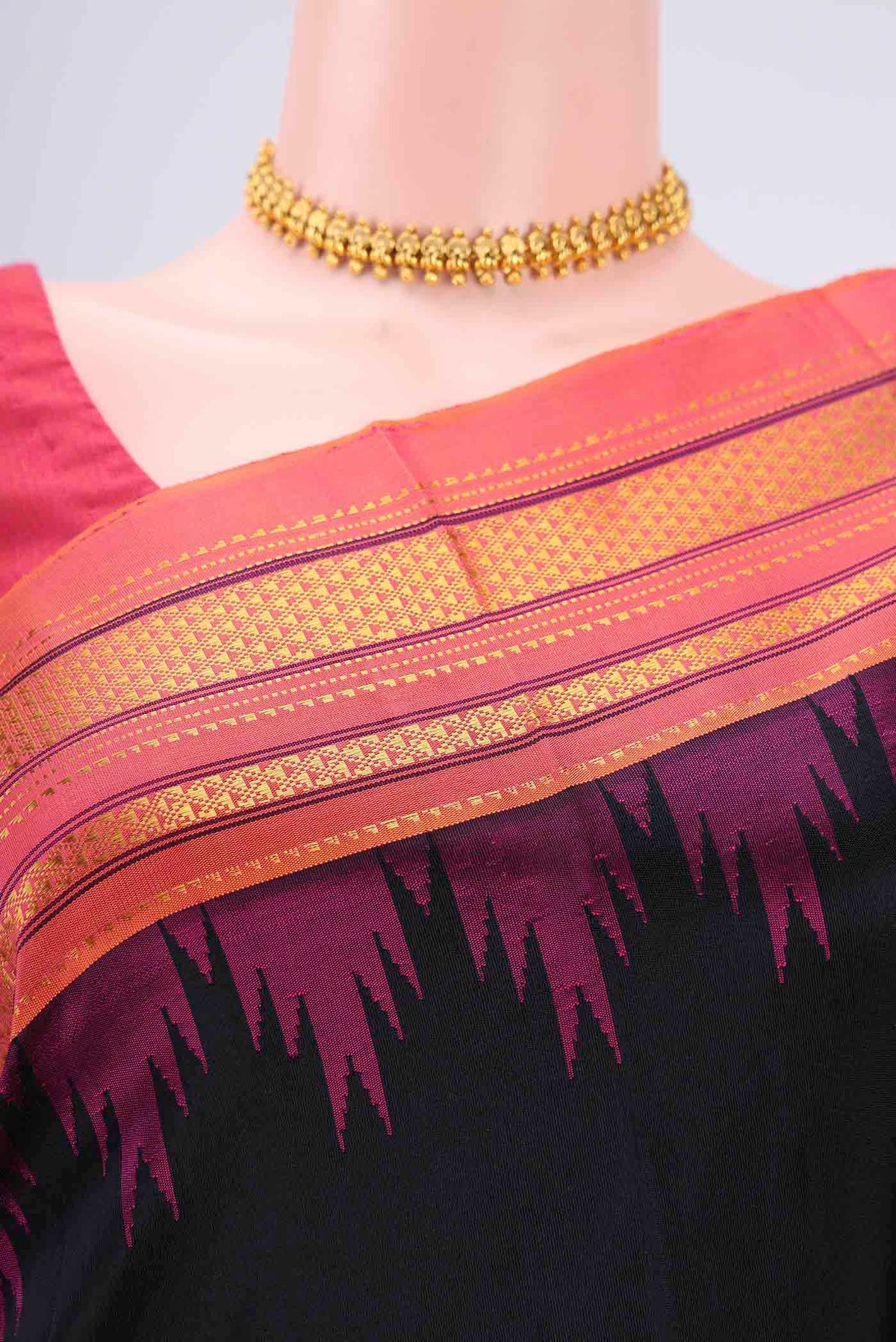 Border image of Black Bangalore Silk Saree with Plain Body and Temple Border. 