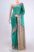 Sea Green Dual Tone Maheshwari Silk Cotton Saree with Stripes on the body and Zari Border.  displayed on a mannequin