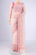 White Blended Kota Cotton Saree with Embroidery on the body and Zari Border.  displayed on a mannequin