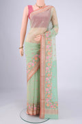 Mint Green Blended Kota Cotton Saree with Embroidery on the body and Zari Border.  displayed on a mannequin