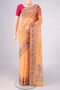 Orange Blended Kota Cotton Saree with Embroidery on the body and Zari Border.  displayed on a mannequin
