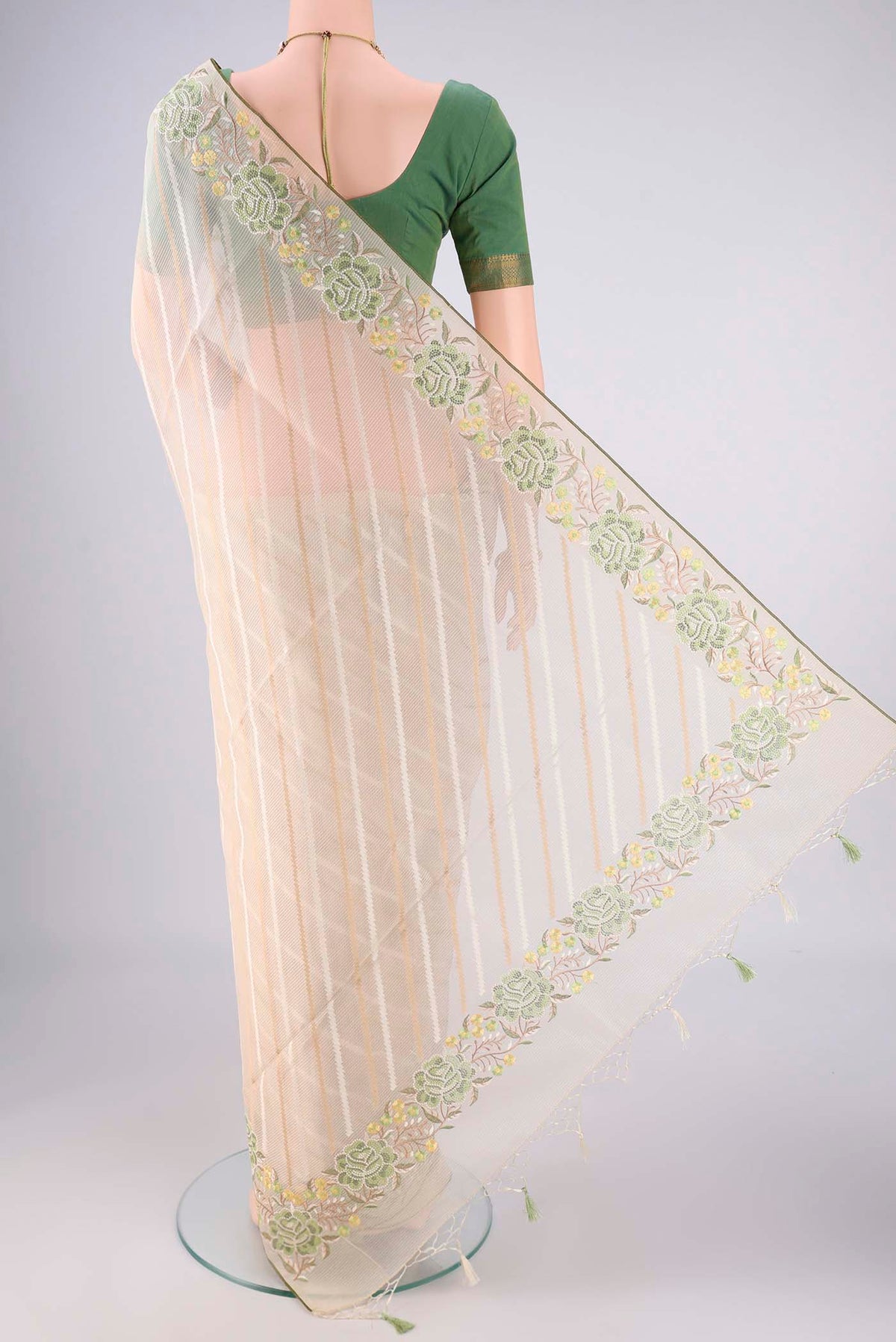 Flat view of Cream Blended Kota Cotton Saree with Stripes on the body and Embroidery Border. 