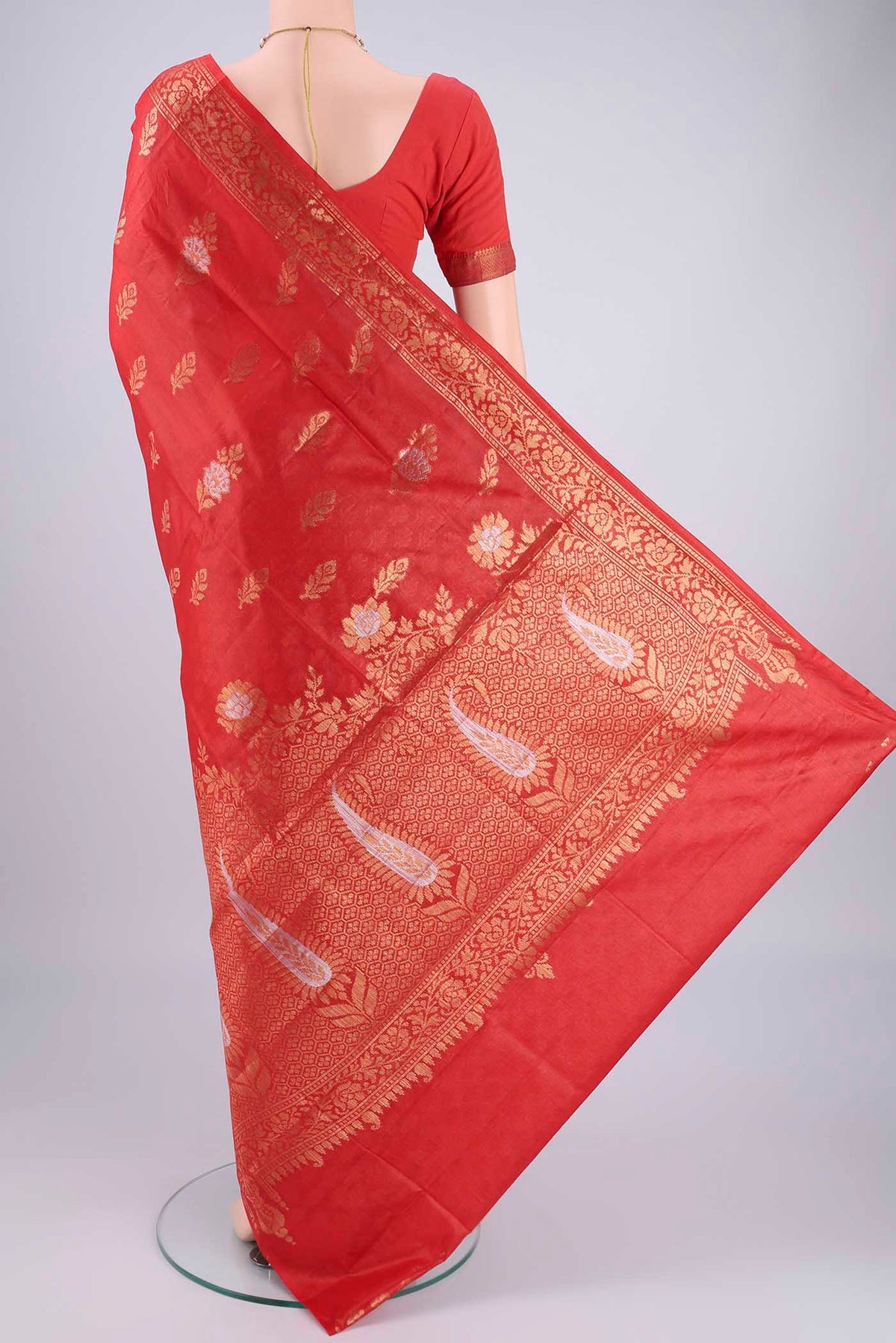 Flat view of Imperial Red Banarasi Tussar Silk Saree with Zari Butta on the body and Zari Border. 