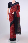 Maroon Pochampally Cotton Saree with Ikat design on the body and Ikat Border.  displayed on a mannequin