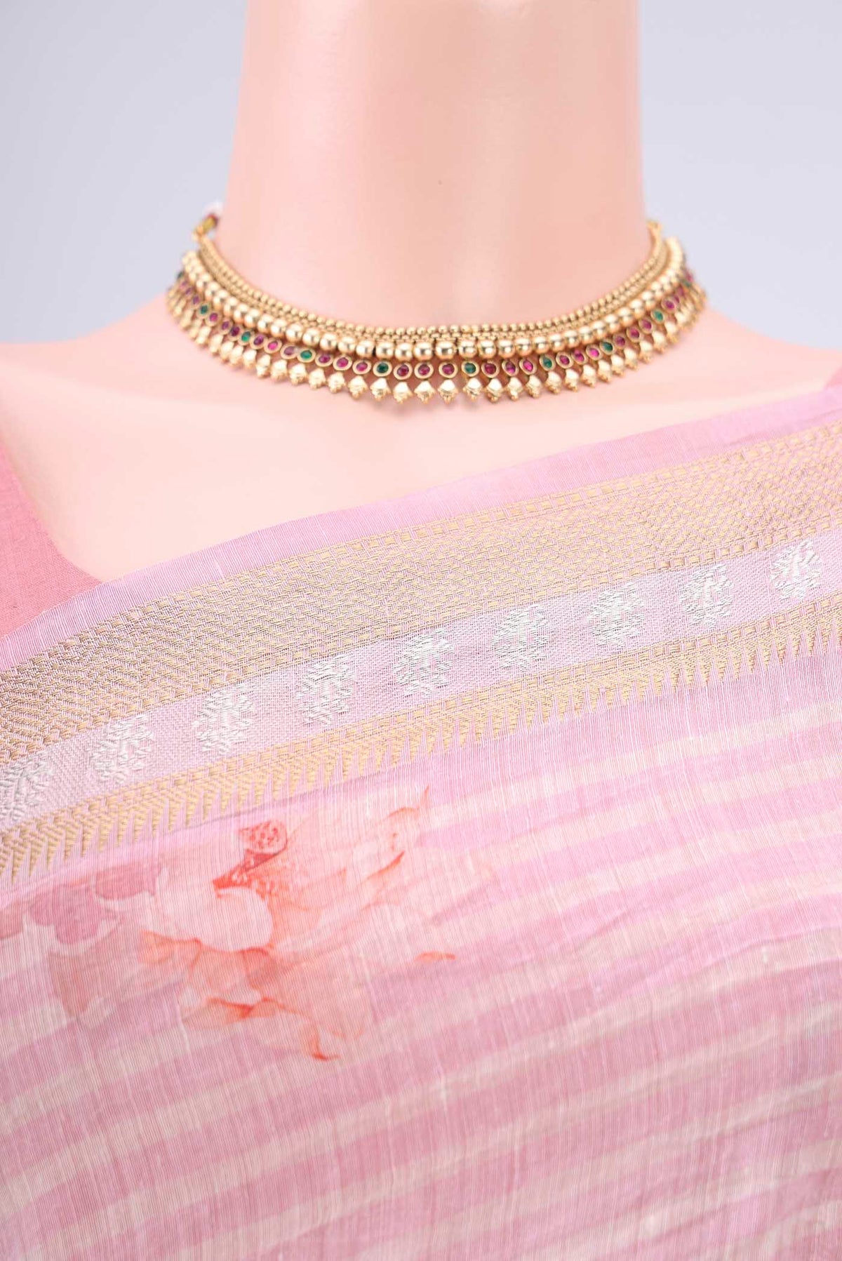 Border image of Off White Linen Saree with Floral Print on the body and Zari Border. 