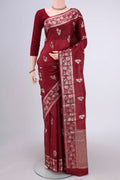 Maroon Banarasi Tussar Silk Saree with Zari Butta on the body and Zari And Thread Border.  displayed on a mannequin