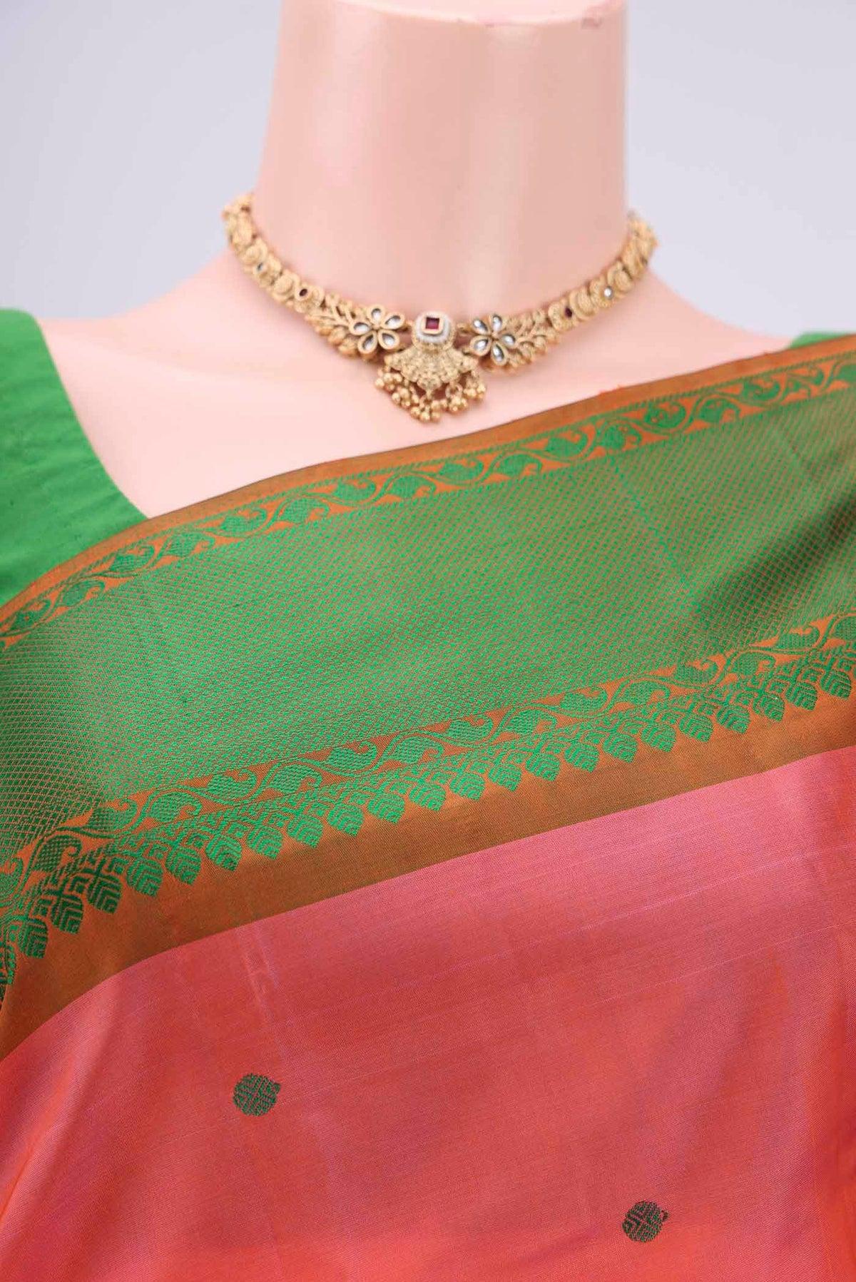 Border image of Peach Kanchipuram Silk Saree with Thread Butta on the body and Thread Border. 