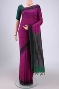 Magenta Blended Poly Cotton Saree with Checked design on the body and Thread Border.  displayed on a mannequin