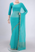 Turquoise Dual Tone Mysore Chiffon Saree with Embroidery on the body and Zari Border.  displayed on a mannequin