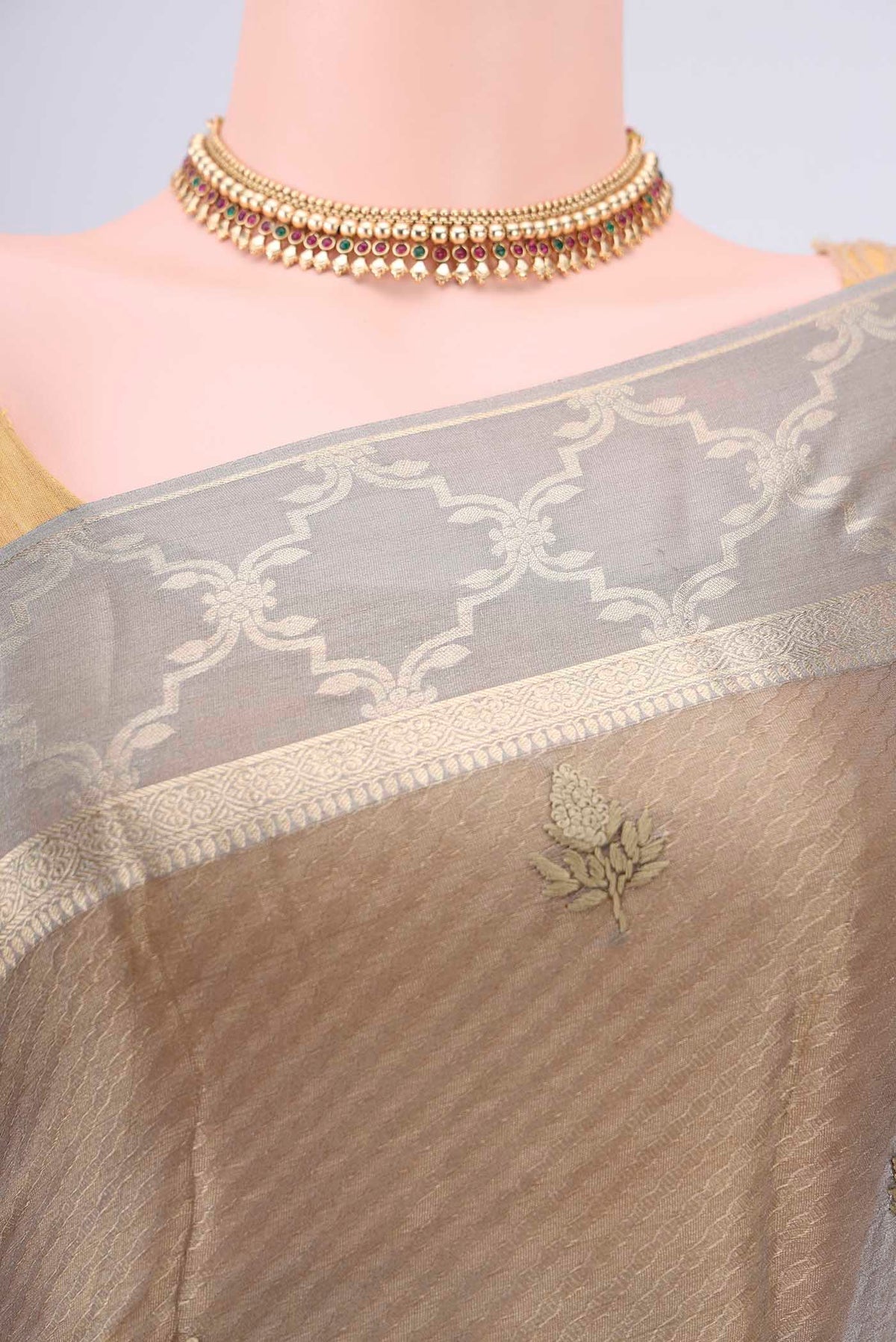 Border image of Davys Grey Mysore Georgette Saree with Embroidery on the body and Zari Border. 