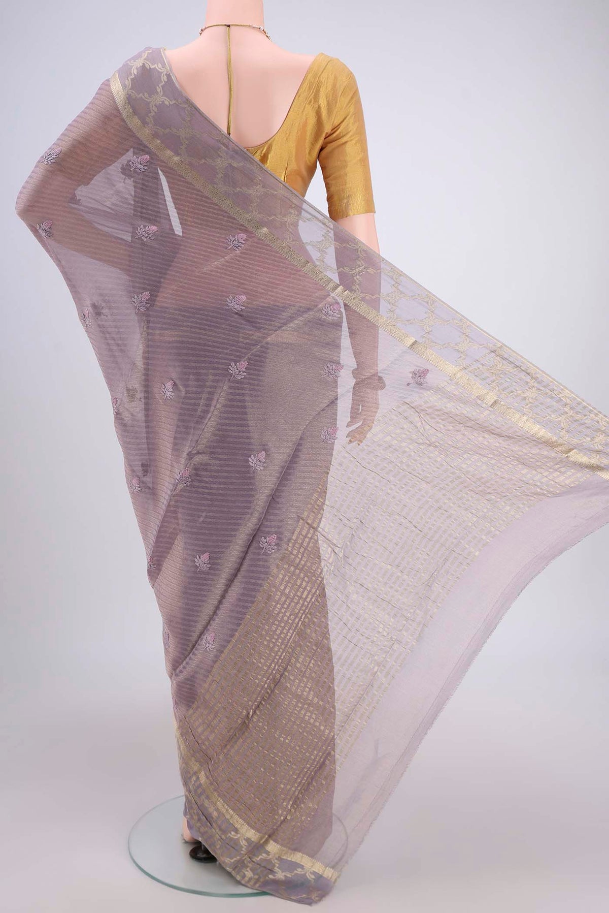 Flat view of Lavender Mysore Georgette Saree with Embroidery on the body and Zari Border. 