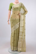 Pista Green Mysore Georgette Saree with Embroidery on the body and Zari Border.  displayed on a mannequin