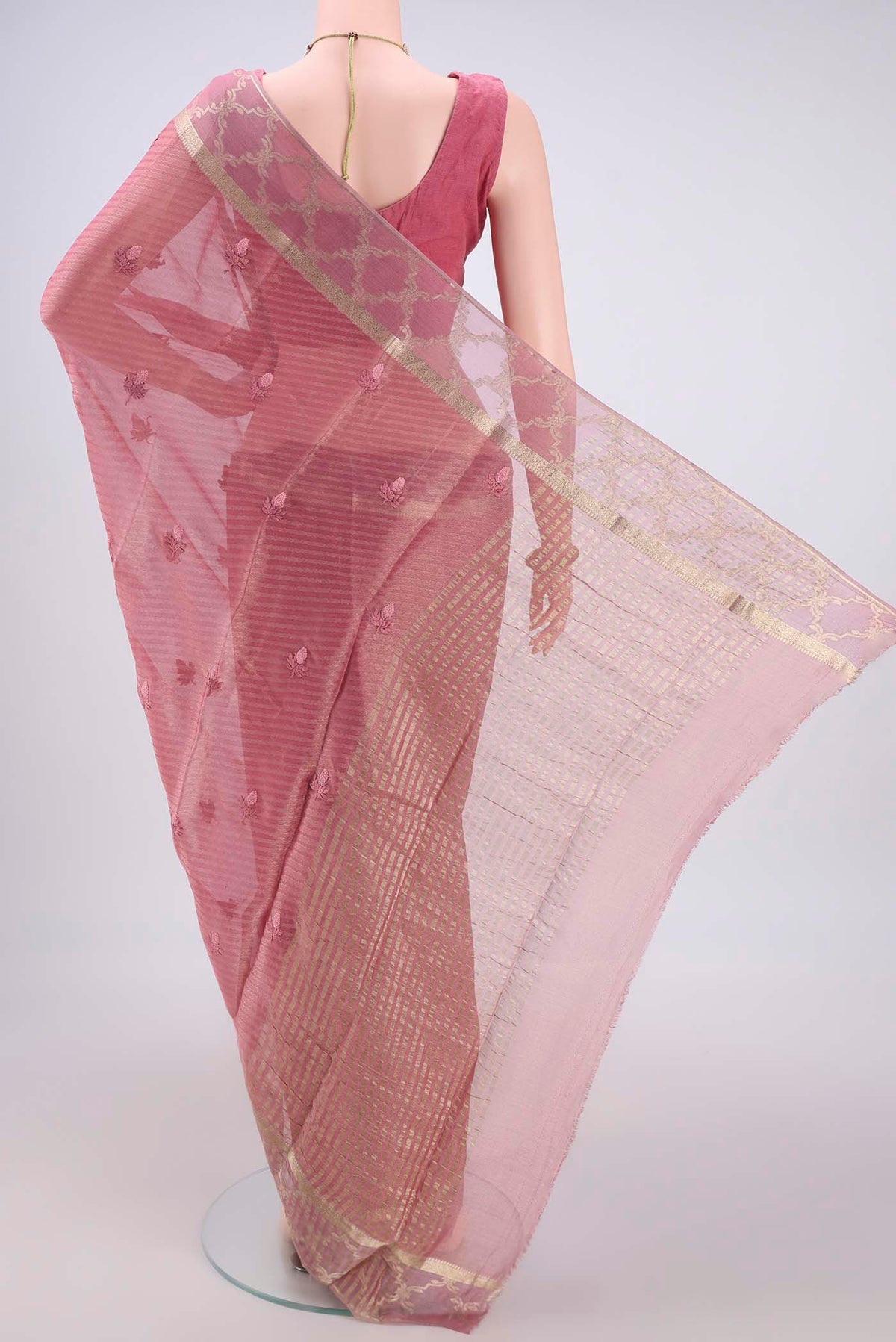 Flat view of Rose Gold Mysore Georgette Saree with Embroidery on the body and Zari Border. 