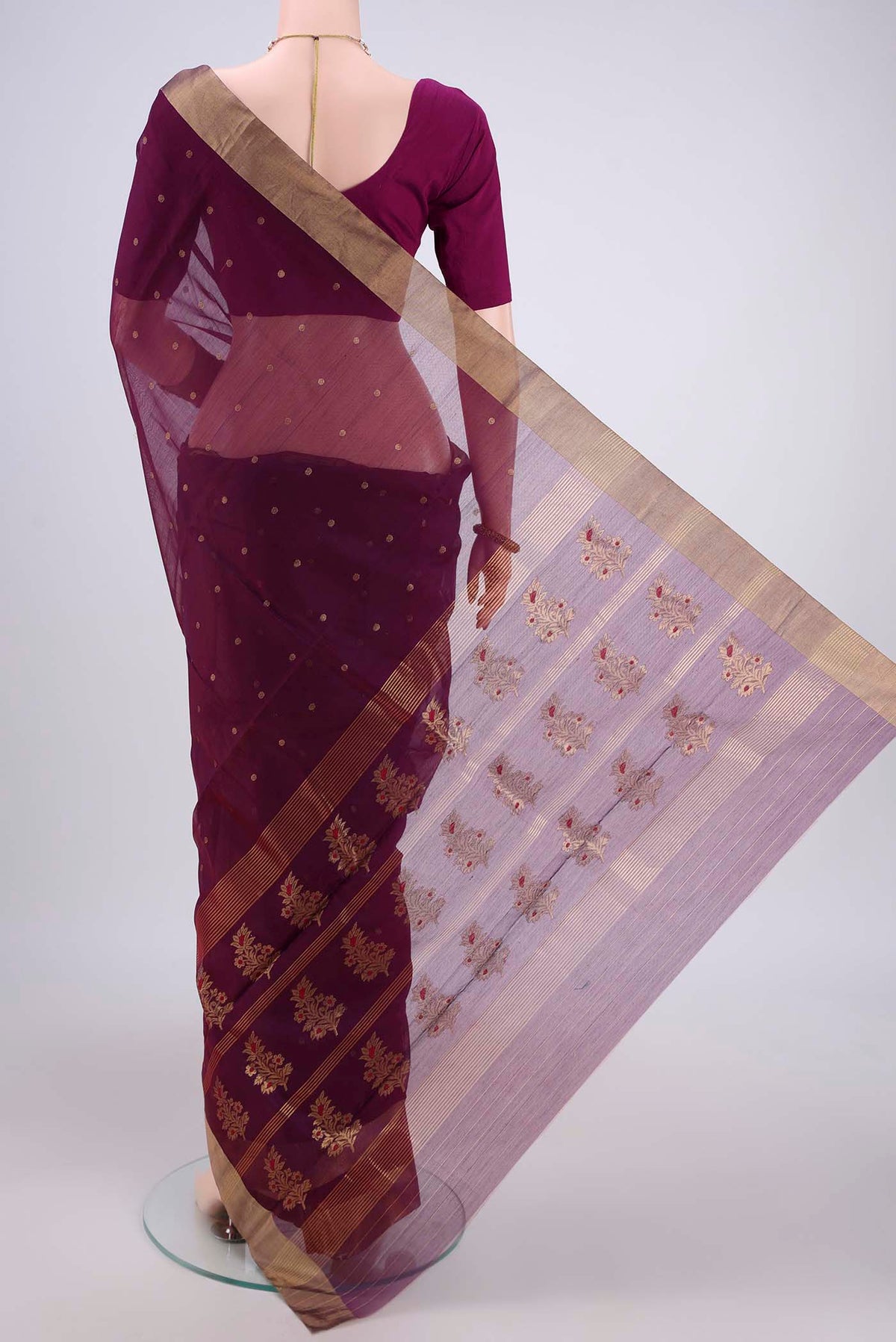 Flat view of Magenta Chanderi Silk Cotton Saree with Zari Butta on the body and Zari Border. 