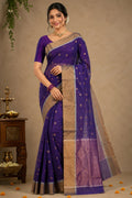 Model wearing a Violet Chanderi Silk Cotton Saree with Zari Butta on the body and Zari Border.