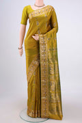 Acid Green Baluchari Silk Saree with Zari And Thread Butta on the body and Zari And Thread Border.  displayed on a mannequin