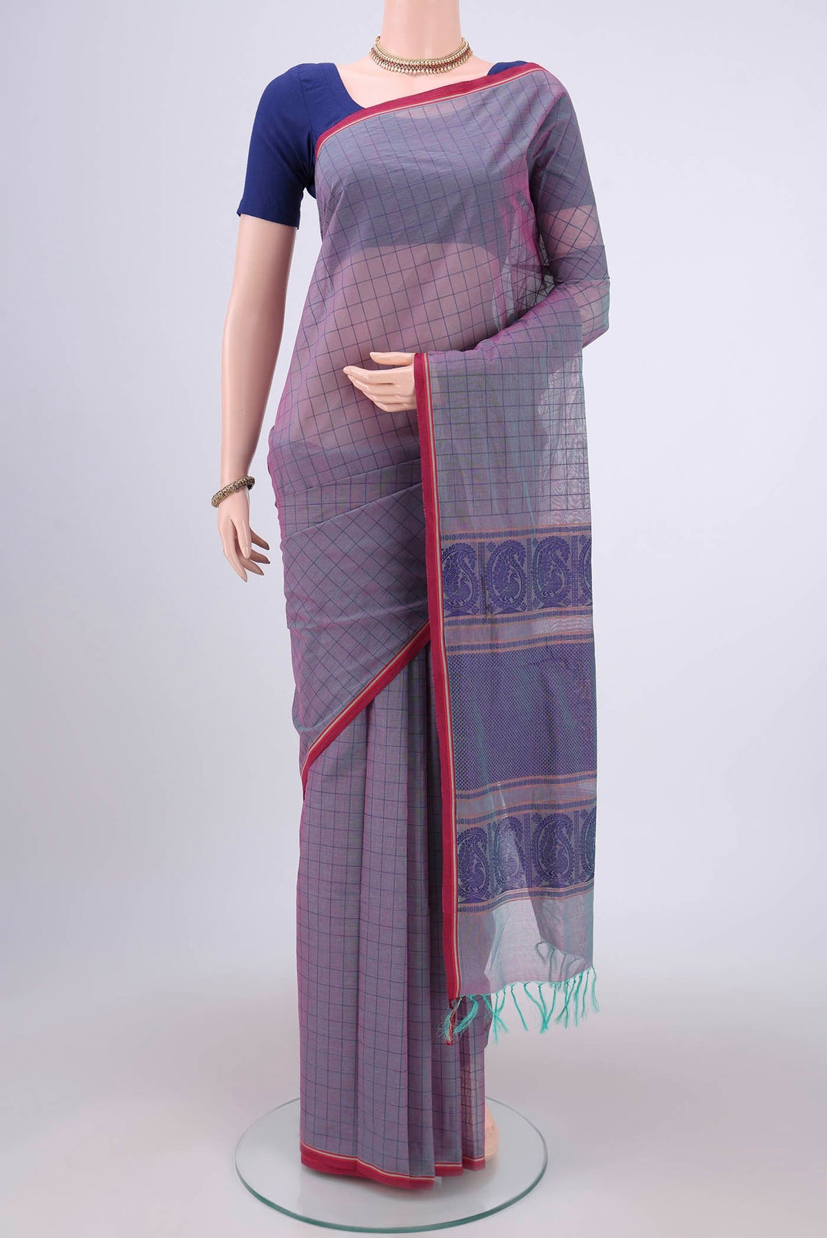 Purple Coimbatore Cotton Saree with Thread Butta on the body and Thread Border.  displayed on a mannequin