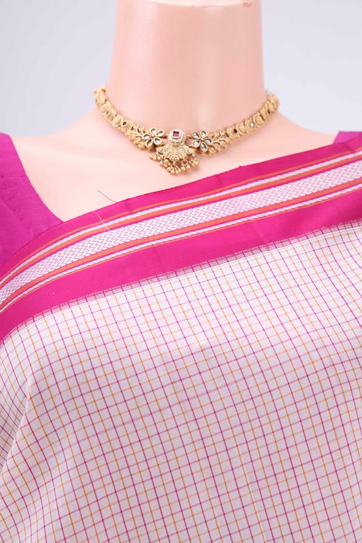Border image of Off White Dual Tone Kanjivaram Silk Saree with Checked design on the body and Thread Border. 