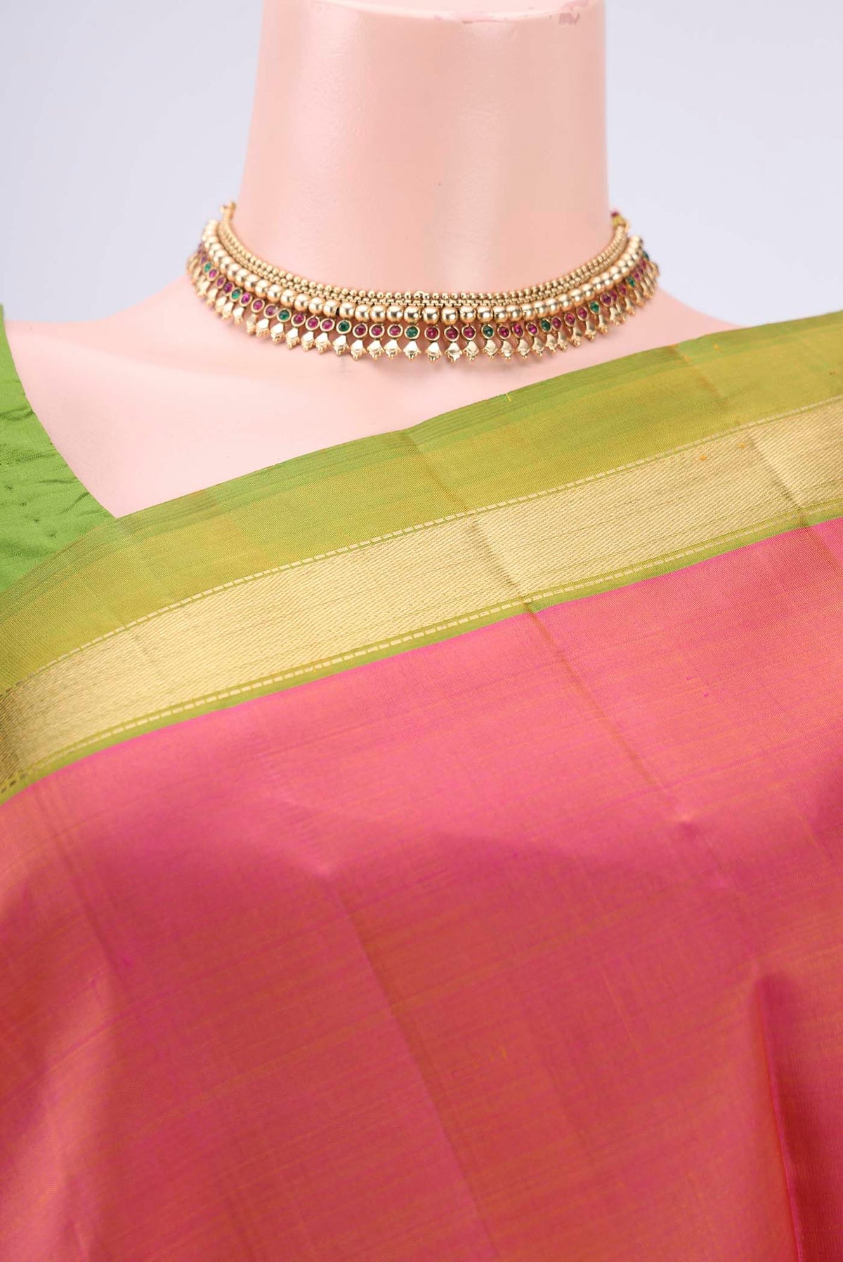 Border image of Brick Orange Dual Tone Kanjivaram Silk Saree with Plain Body and Zari Border. 