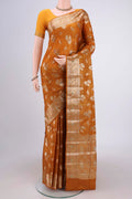 Mustard Banarasi Tussar Silk Saree with Zari Butta on the body and Zari Border.  displayed on a mannequin