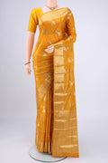 Mustard Banarasi Tussar Silk Saree with Zari And Thread Butta on the body and Zari And Thread Border.  displayed on a mannequin