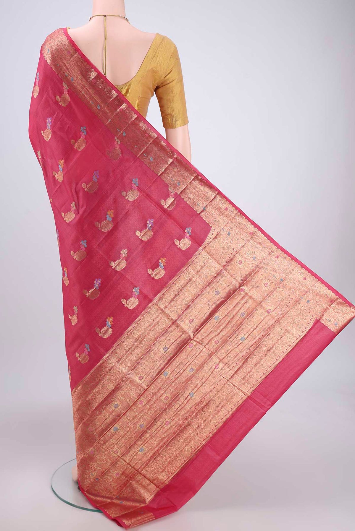 Flat view of Pink Banarasi Raw Silk Saree with Zari And Thread Butta on the body and Zari And Thread Border. 