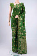 Green Banarasi Tussar Silk Saree with Zari And Thread Butta on the body and Zari And Thread Border.  displayed on a mannequin