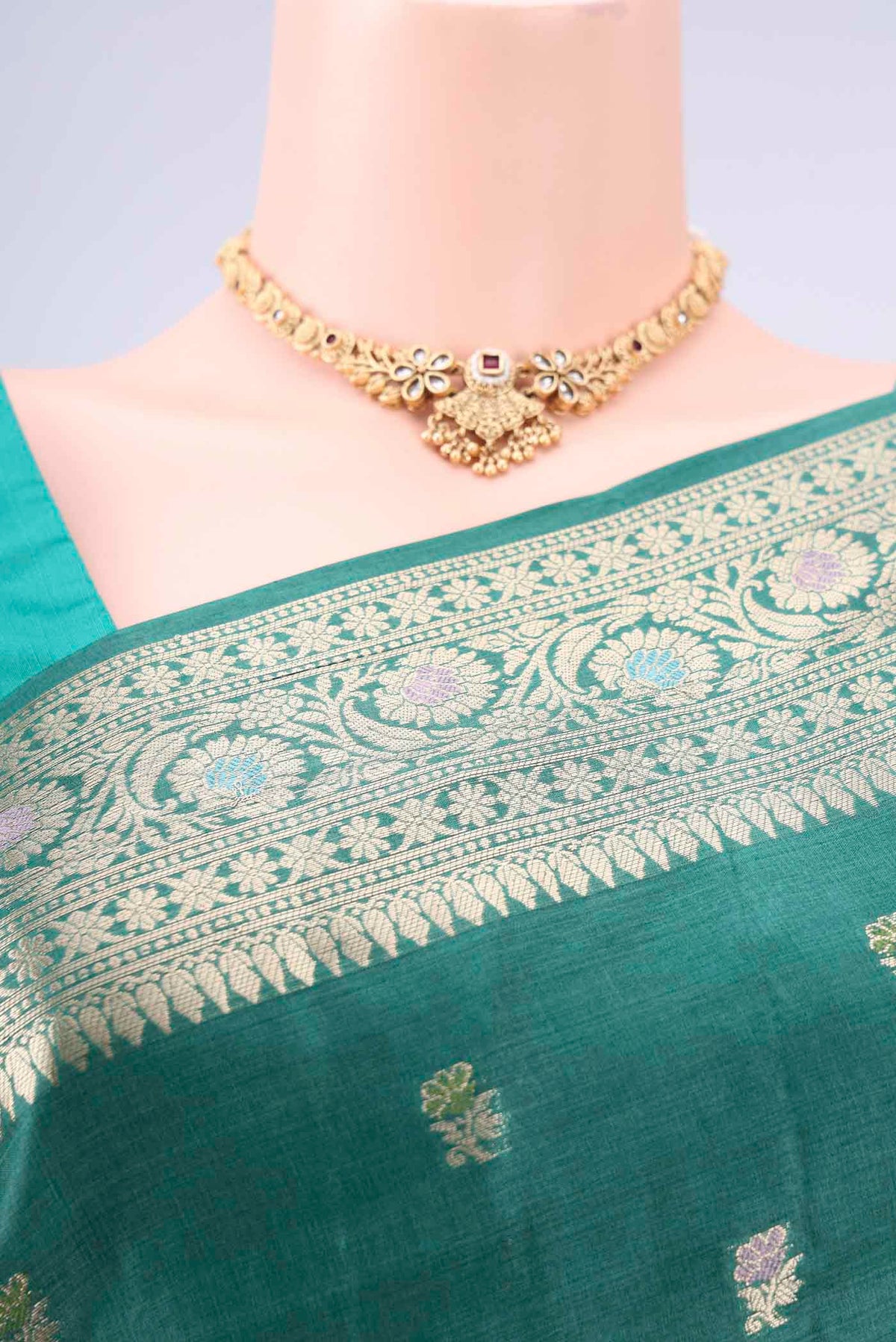 Border image of Green Banarasi Tussar Silk Saree with Zari Butta on the body and Zari And Thread Border. 