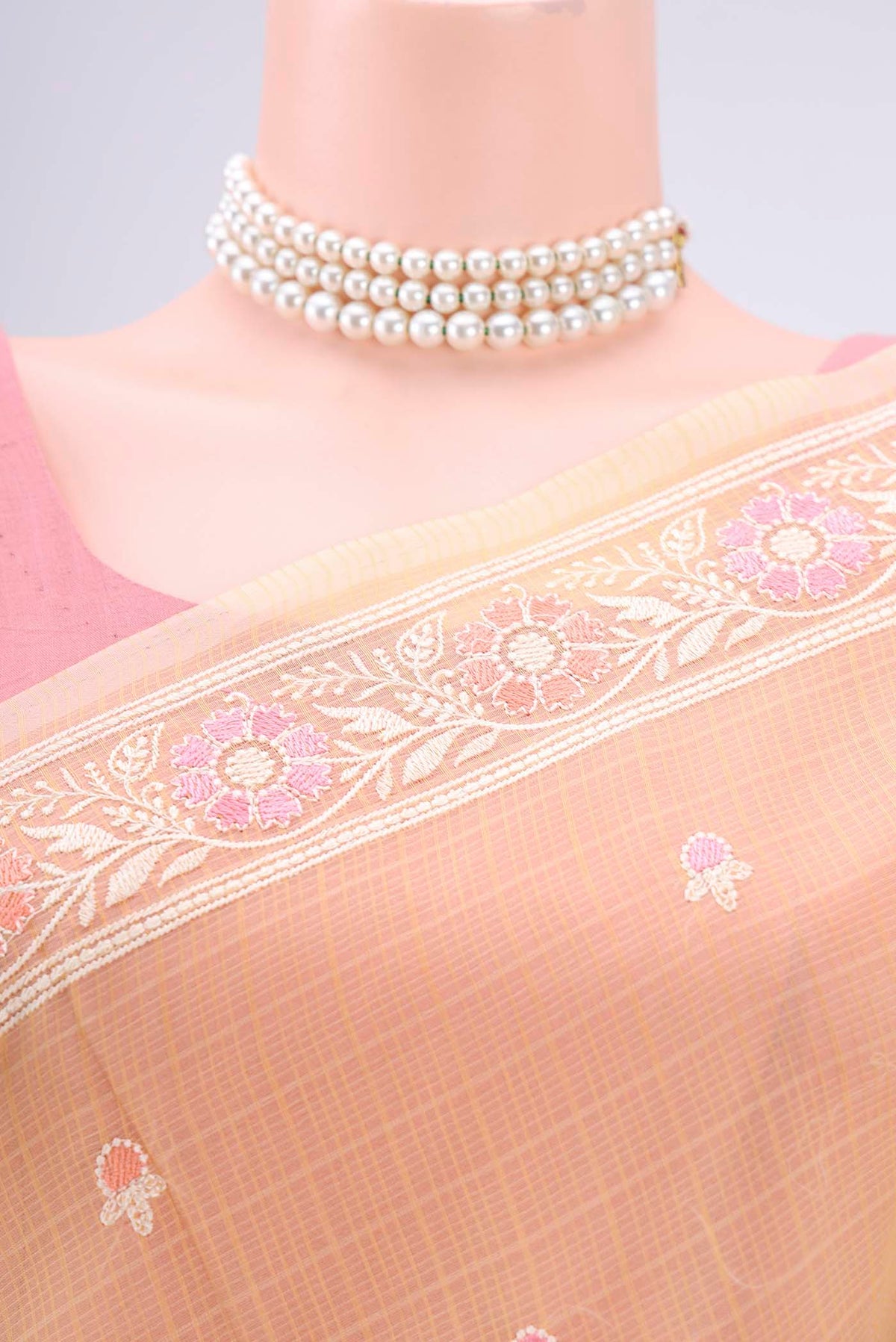 Border image of Yellow Blended Kota Cotton Saree with Embroidery on the body and Embroidery Border. 