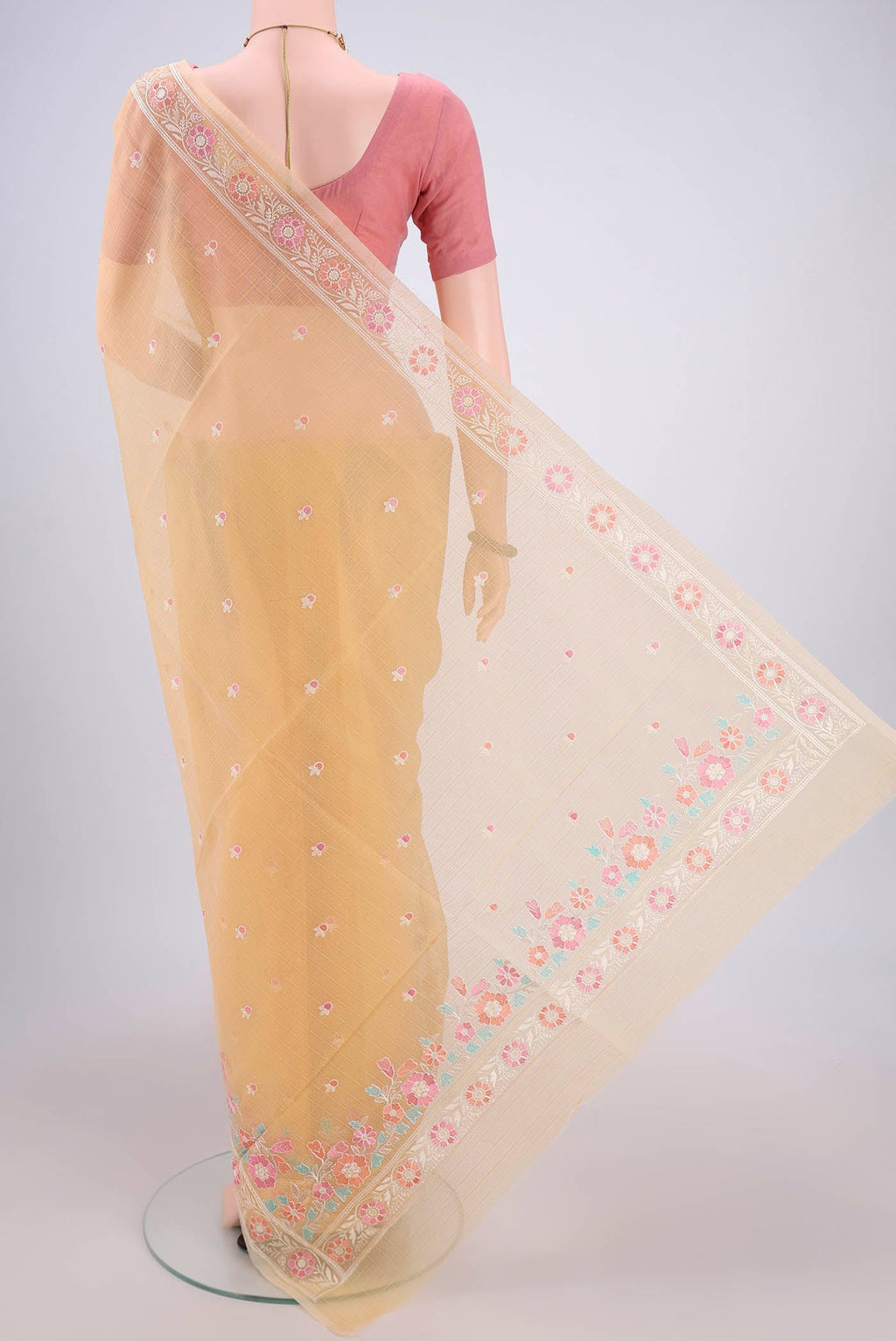 Flat view of Yellow Blended Kota Cotton Saree with Embroidery on the body and Embroidery Border. 
