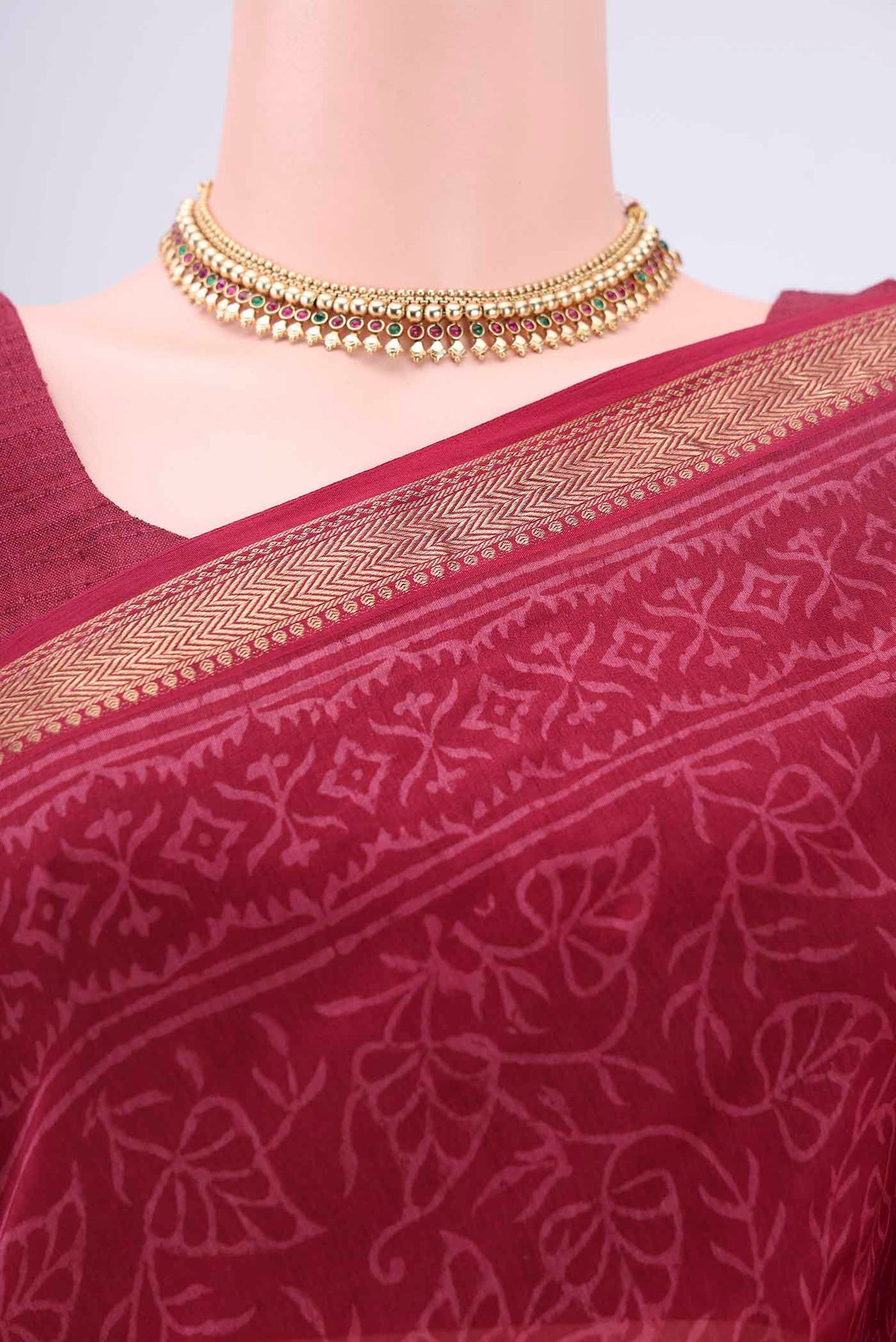 Border image of Maroon Maheshwari Silk Cotton Saree with Printed design on the body and Zari Border. 