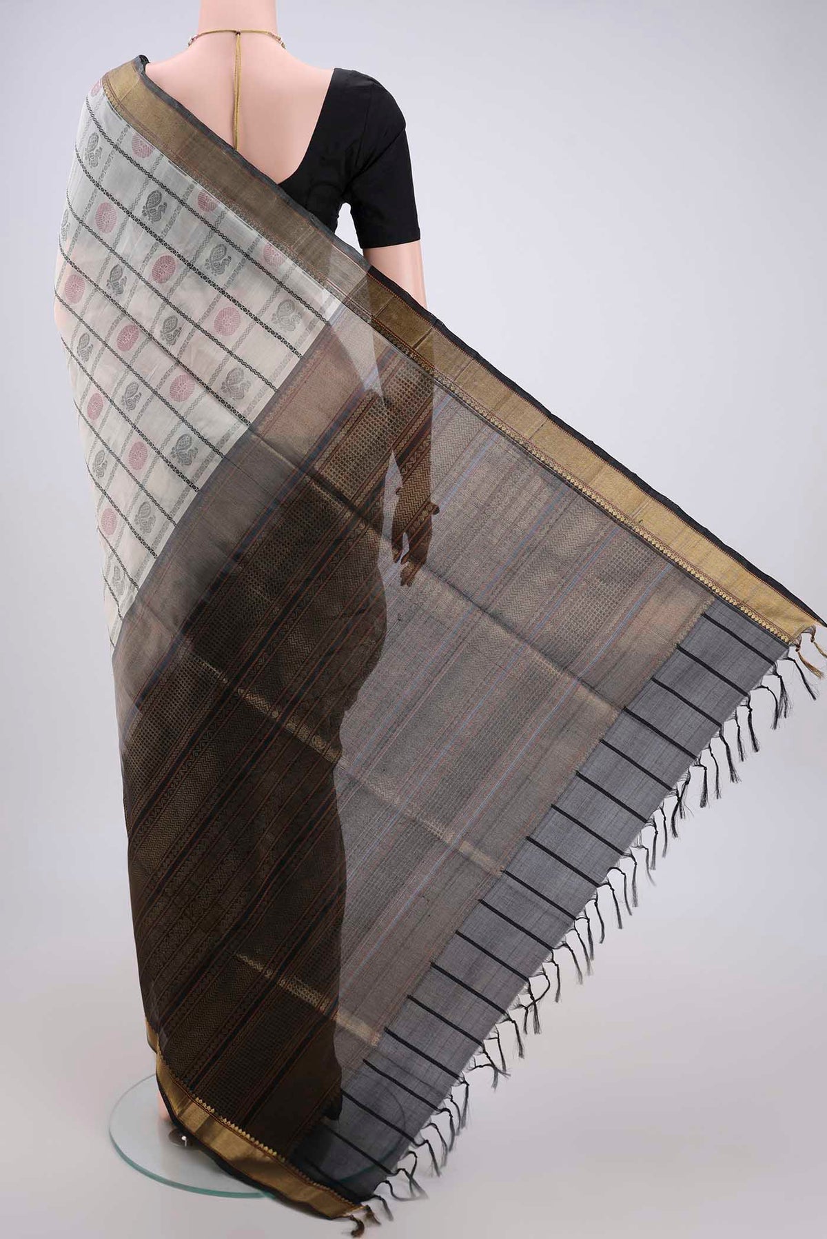 Flat view of Off White Coimbatore Silk Cotton Saree with Checked design on the body and Zari Border. 