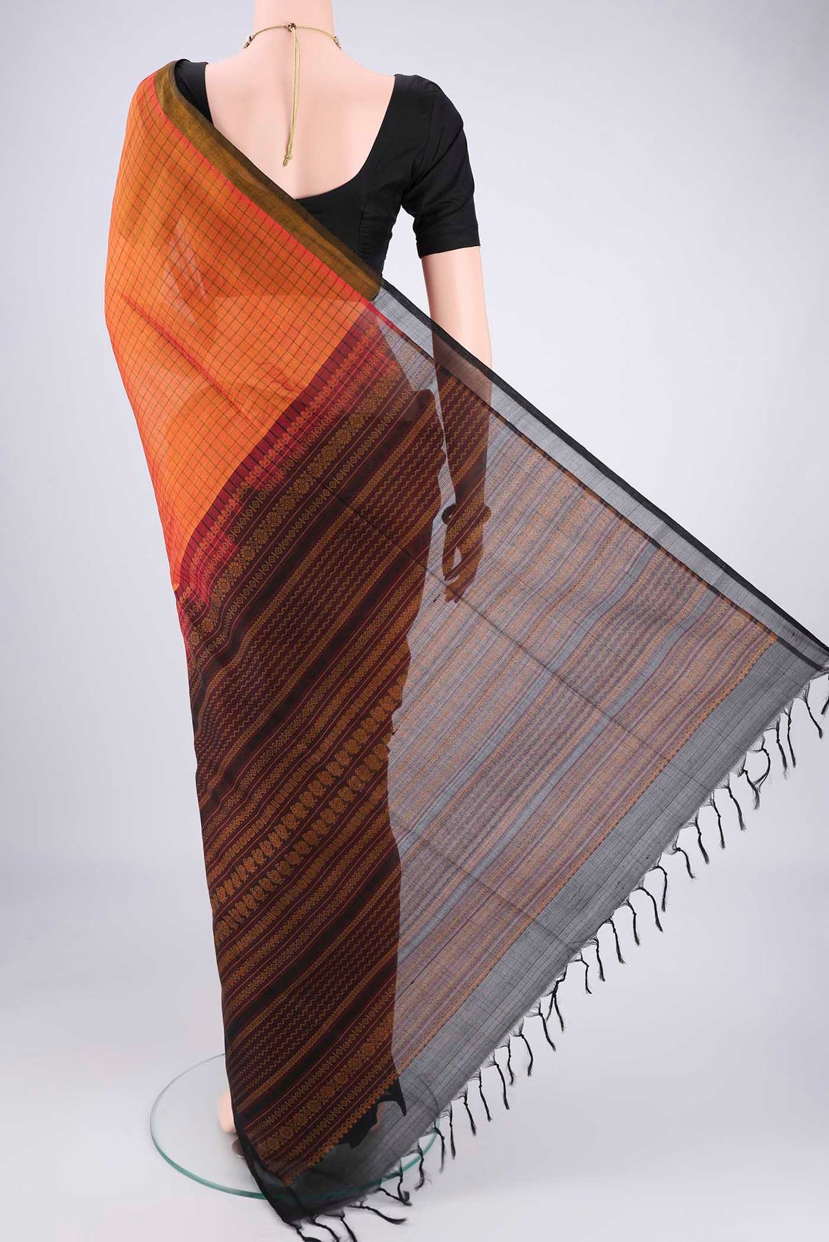 Flat view of Rust Coimbatore Silk Cotton Saree with Checked design on the body and Plain Border. 