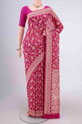Rani Pink Banarasi Georgette Saree with Zari Brocade on the body and Zari Border.  displayed on a mannequin