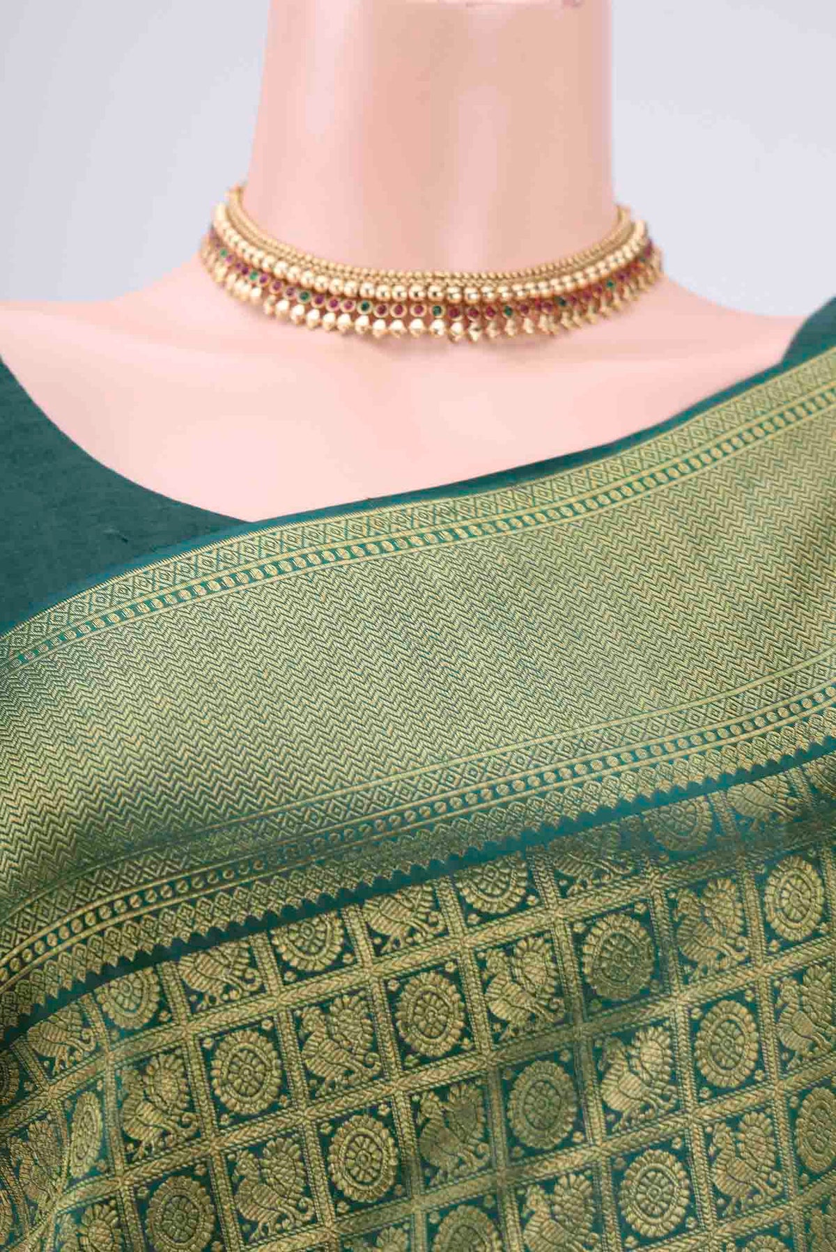 Border image of Bottle Green Kanjivaram Silk Saree with Zari Brocade on the body and Zari Border. 