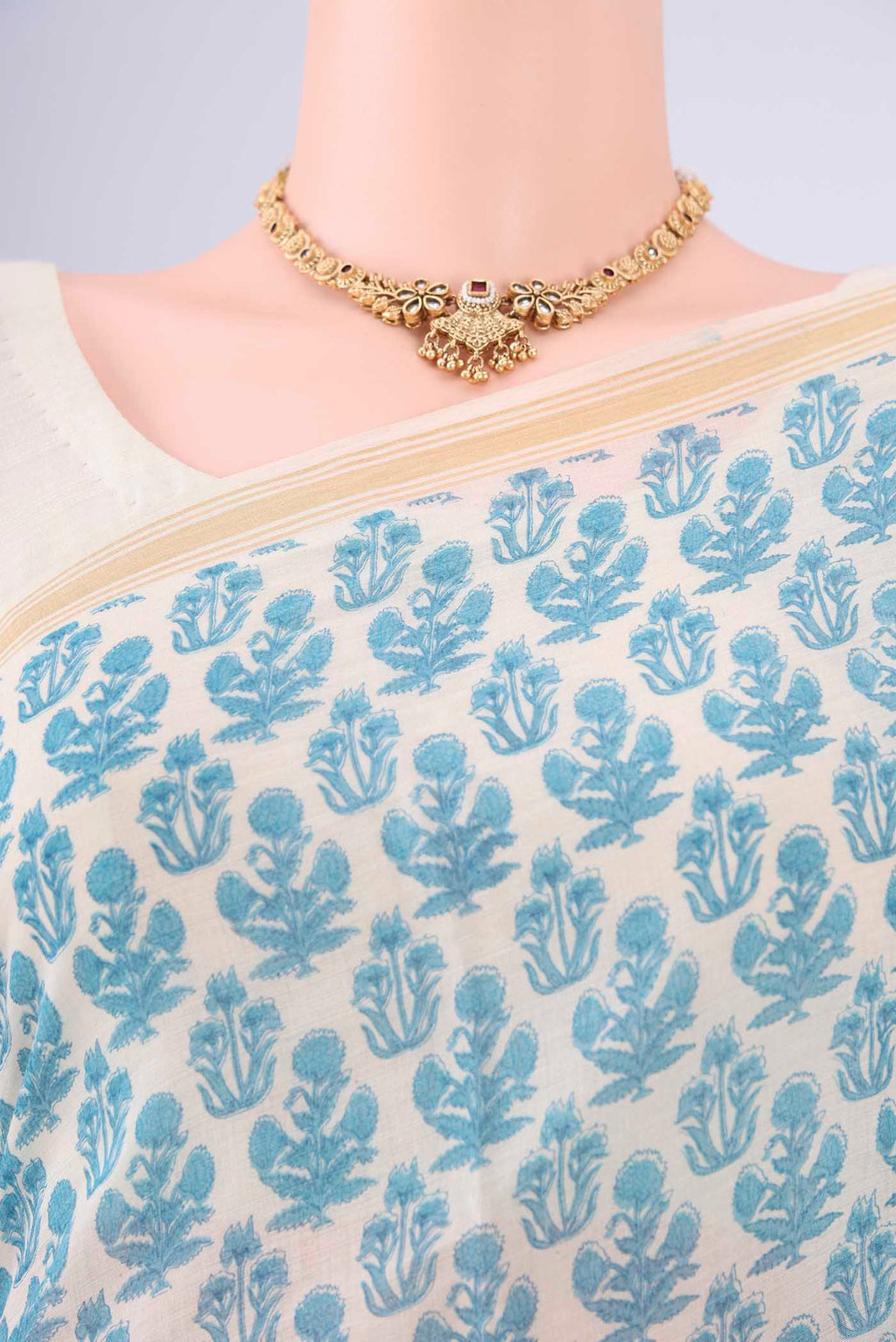 Border image of Off White Tussar Silk Saree with Floral Print on the body and Thread Border. 