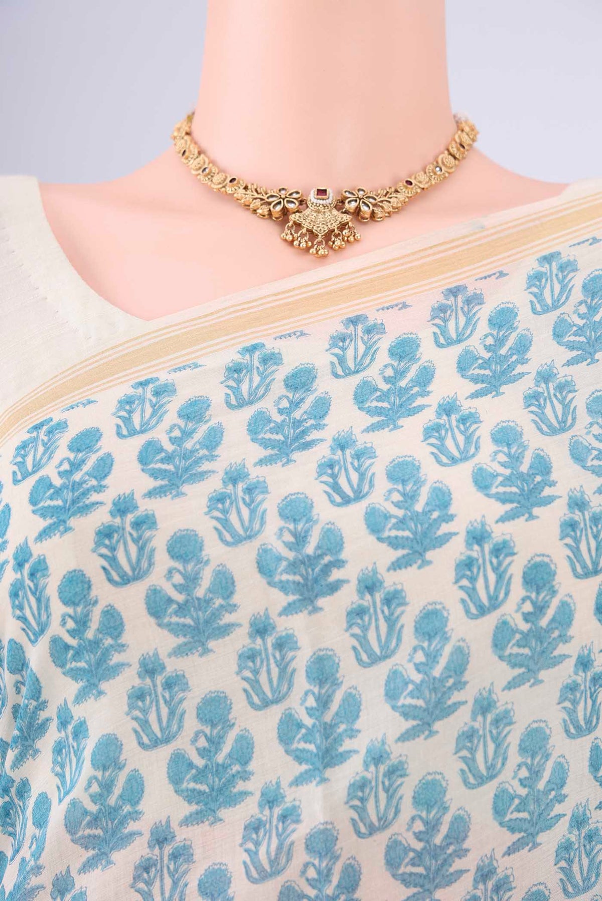 Border image of Off White Tussar Silk Saree with Floral Print on the body and Thread Border. 
