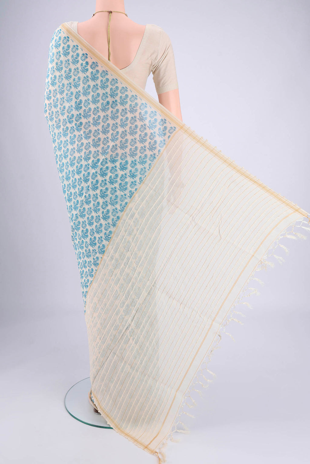 Flat view of Off White Tussar Silk Saree with Floral Print on the body and Thread Border. 
