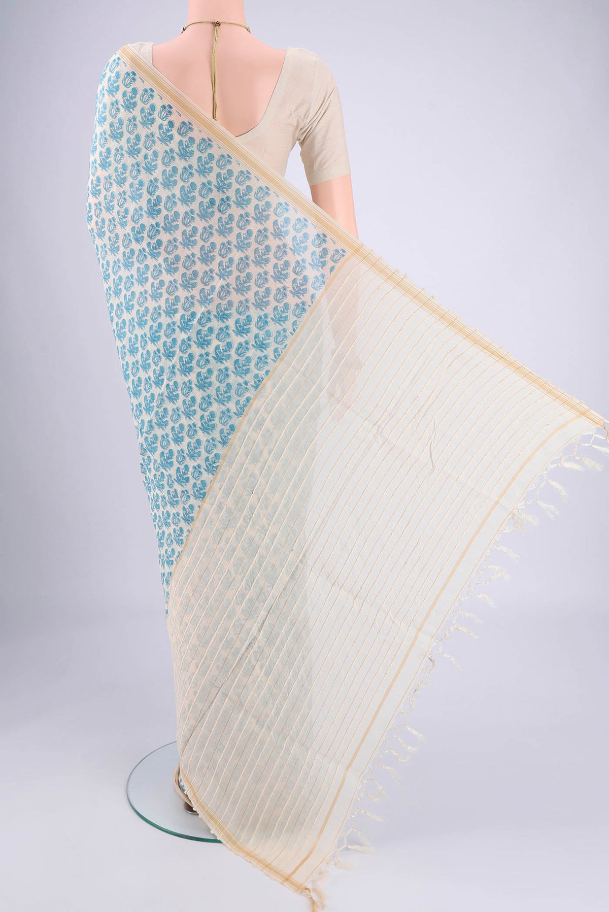 Flat view of Off White Tussar Silk Saree with Floral Print on the body and Thread Border. 