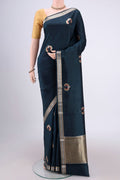 Navy Blue Banarasi Katan Silk Saree with Zari Butta on the body and Zari Border.  displayed on a mannequin