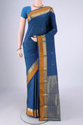 Peacock Blue Dual Tone Blended Bangalore Silk Saree with Zari Butta on the body and Zari Border.  displayed on a mannequin