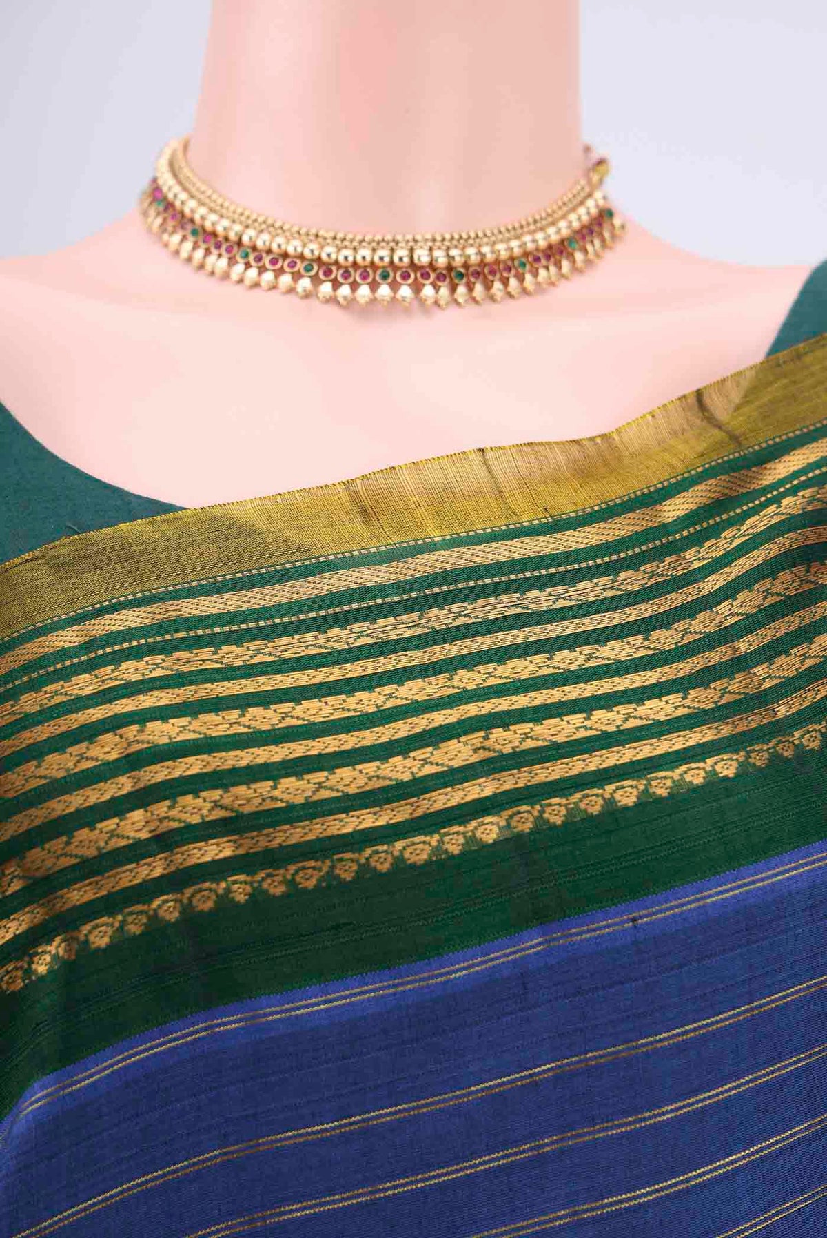 Border image of Blue Gadwal Silk Saree with Stripes on the body and Zari Border. 